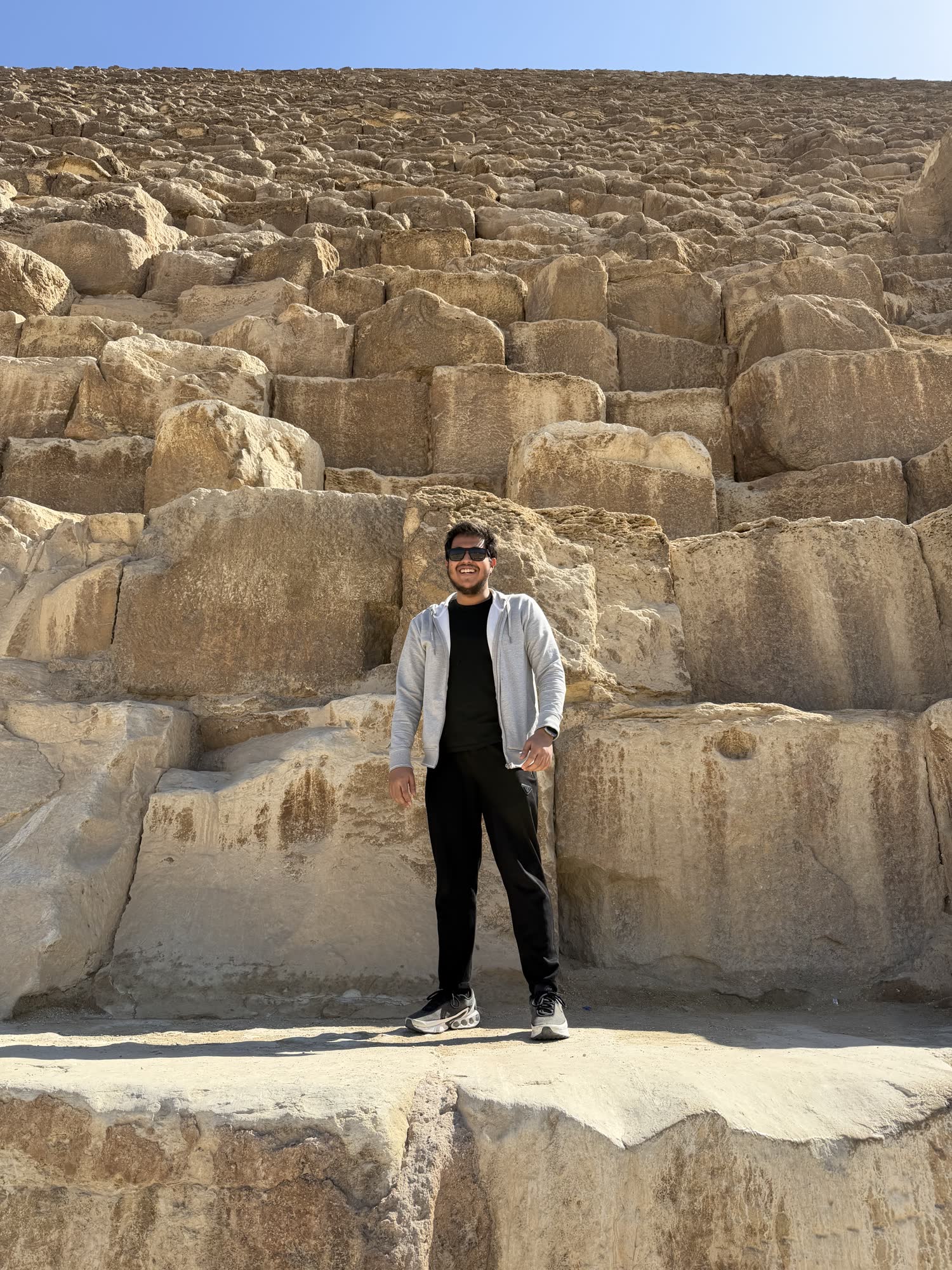 Nafis standing at the Great Pyramid of Giza
